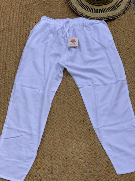 White  flairy trouser , ibiza  fashion , Ibiza boho fashion , classic straight  trouser , bohemian resort wear style , beachwear
