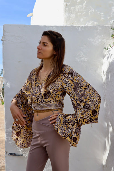 Wrap blouse in silky happy prints