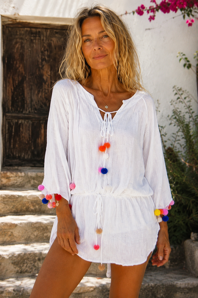 Aurobelle Ibiza white boho blouse with colourful pompon trim, front view