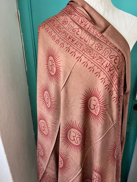 Aurobelle Ibiza Om mantra sarong in dusty rose, draped as a wrap