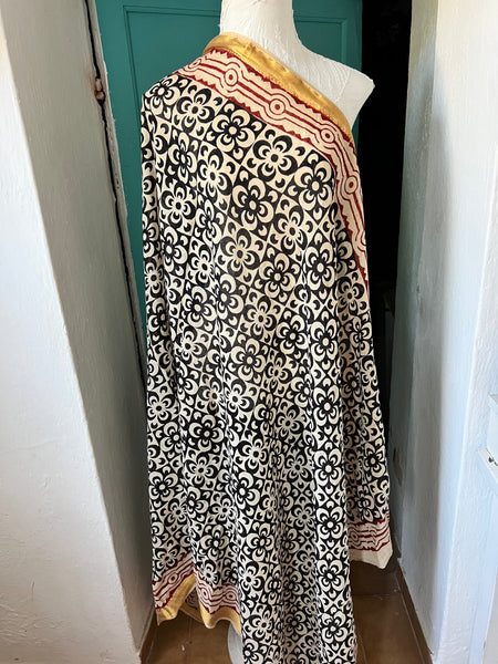 Aurobelle Ibiza Es Vedrà sarong, black and ivory block print with gold border, full length view