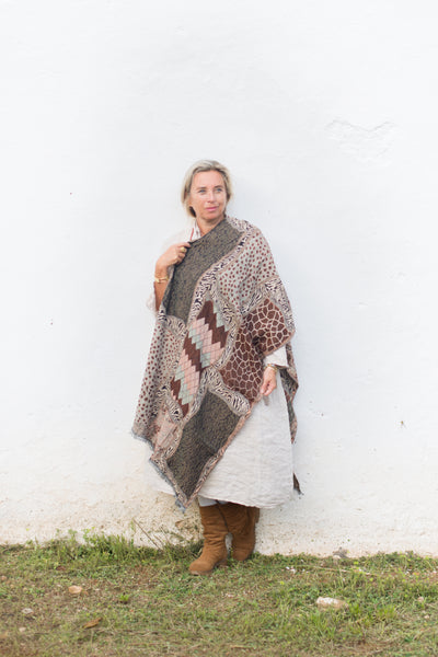Cosy merino wool shawl in warm natural beige and brown abstract design
